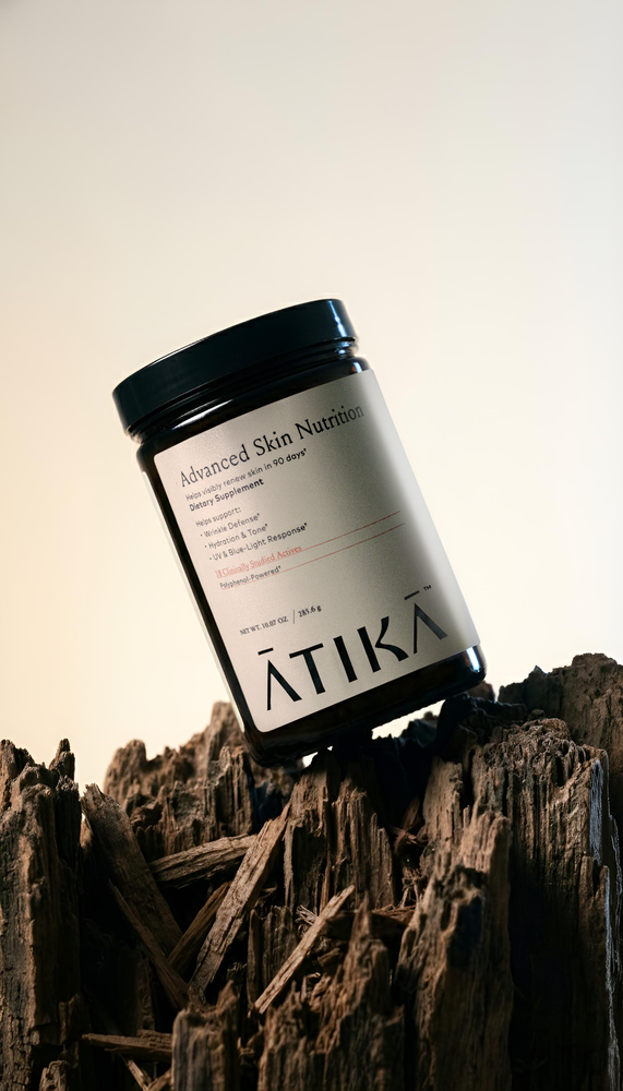 Atika jar on rugged wood surface
